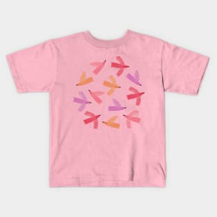 Whimsy flying birds in pink tones Kids T-Shirt